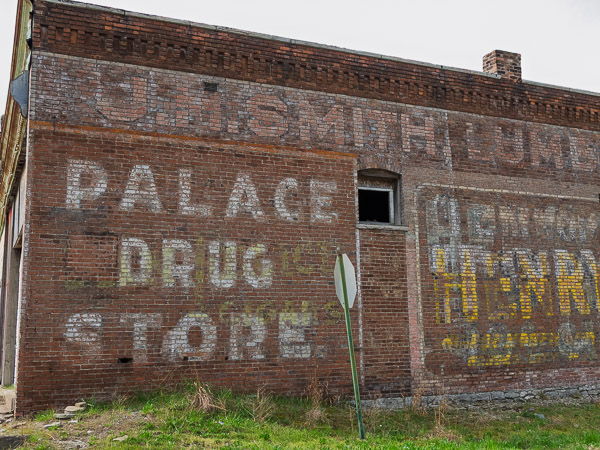 Ghost signs on brick garage in Galena, Kansas