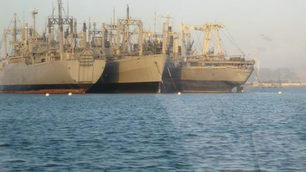 Sturgeon fishing on Suison Bay, mothball fleet