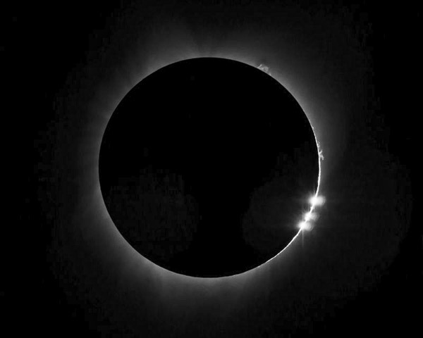 My fiend Luke was able to get this great image. I had not removed my solar filter at totality and didn't catch the Baily's beads where the sun shines through the mountain passes on the moon.