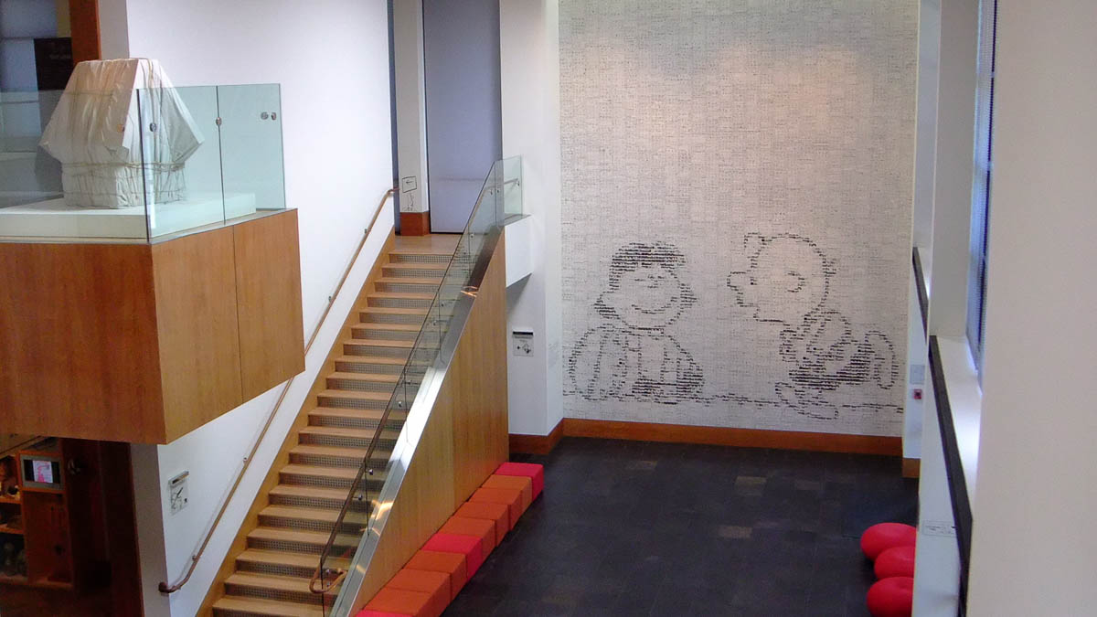 Charles Schultz Museum mosair of cartoon strips forming Charley Brown and Lucy holding the football