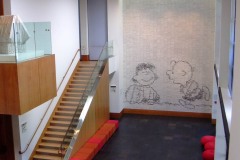 Charles Schultz Museum mosair of cartoon strips forming Charley Brown and Lucy holding the football