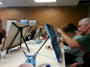 Workday team event with wine and painting pictures