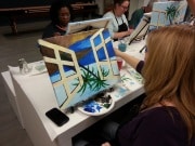 Workday team event with wine and painting pictures