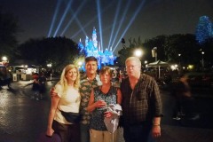 My sisters and brother-in-law in front of Slleping Beauty's castle.
