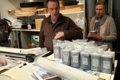Oliver in his workshop discussing supply requirements for the printers