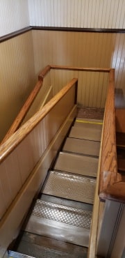 Winchester Mystery House in San Jose. A very narrow staircase that folds back on itself tostay compact.