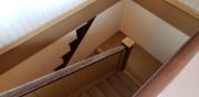 Winchester Mystery House in San Jose. This staircase was replaced after a fire. You can see the original riser on the one wall. Staircase was replaced with smaller steps and more of them