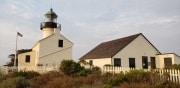 Cabrillo National Monument lite in purple in gold to commorate the passing in the 19th amendment for women's right to vote